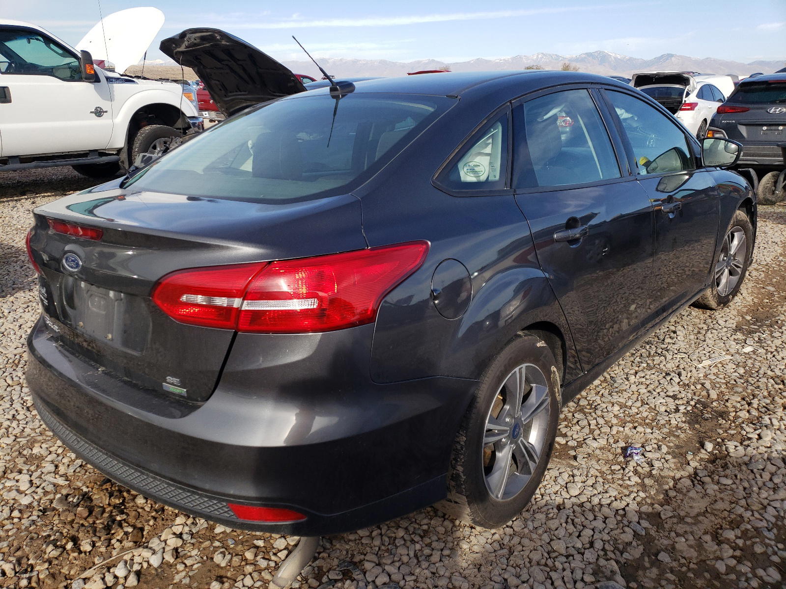 Photo 4 from auction – 2018 FORD FOCUS SE with VIN 1FADP3FE6JL322200