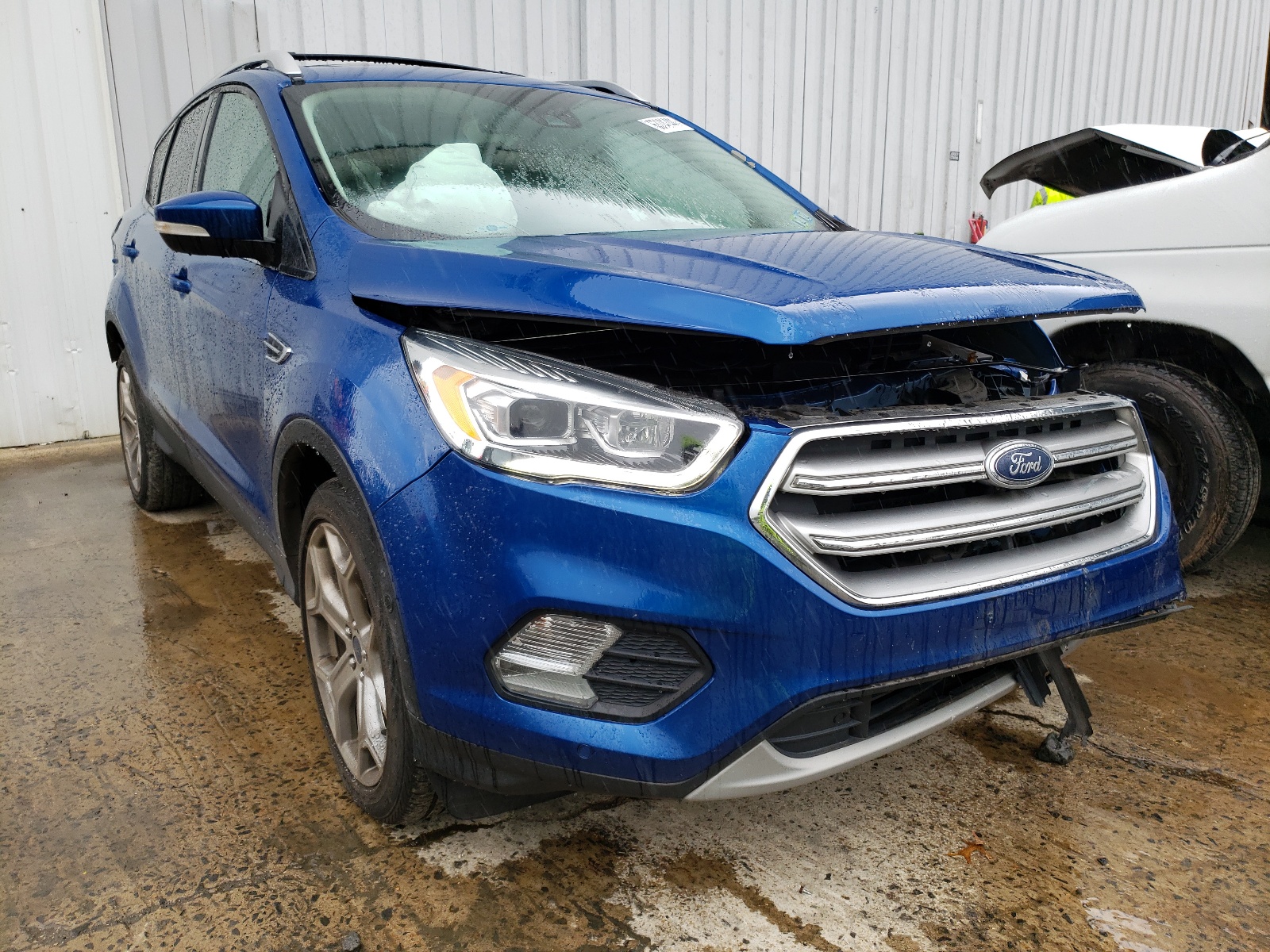 Photo 1 from auction – 2017 FORD ESCAPE TIT with VIN 1FMCU9J91HUD02917
