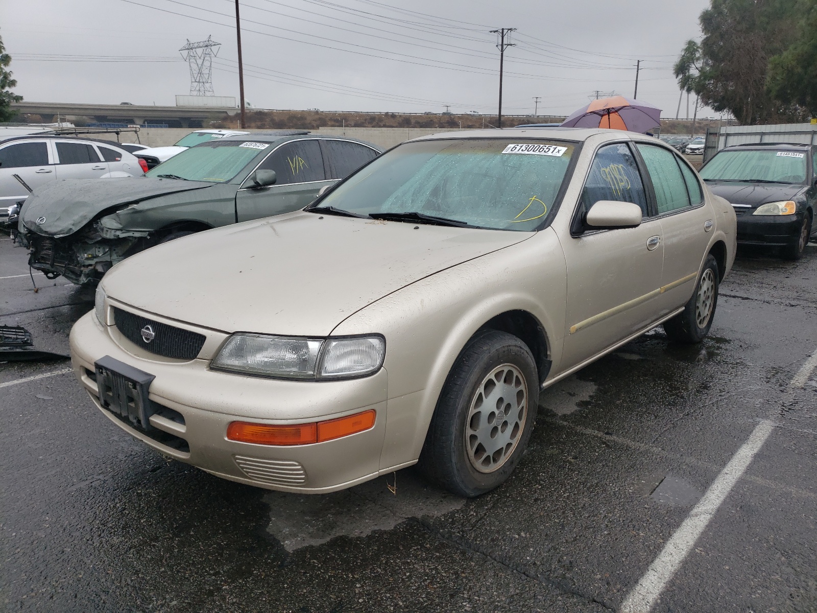 Photo 2 from auction – 1995 NISSAN MAXIMA GLE with VIN JN1CA21D1ST657112