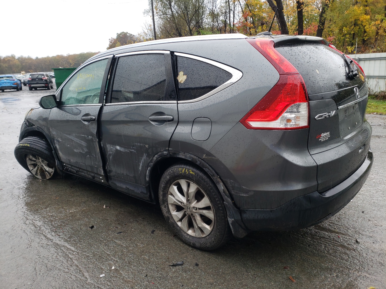 Photo 3 from auction – 2014 HONDA CR-V EXL with VIN 5J6RM3H70EL024491