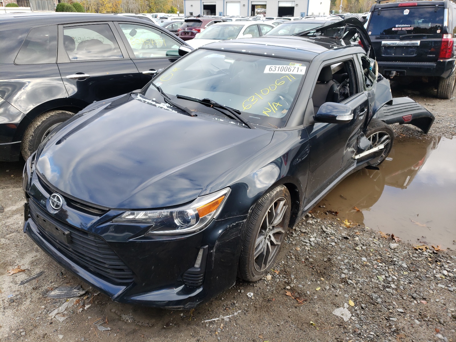 Photo 2 from auction – 2015 TOYOTA SCION TC with VIN JTKJF5C75FJ013282