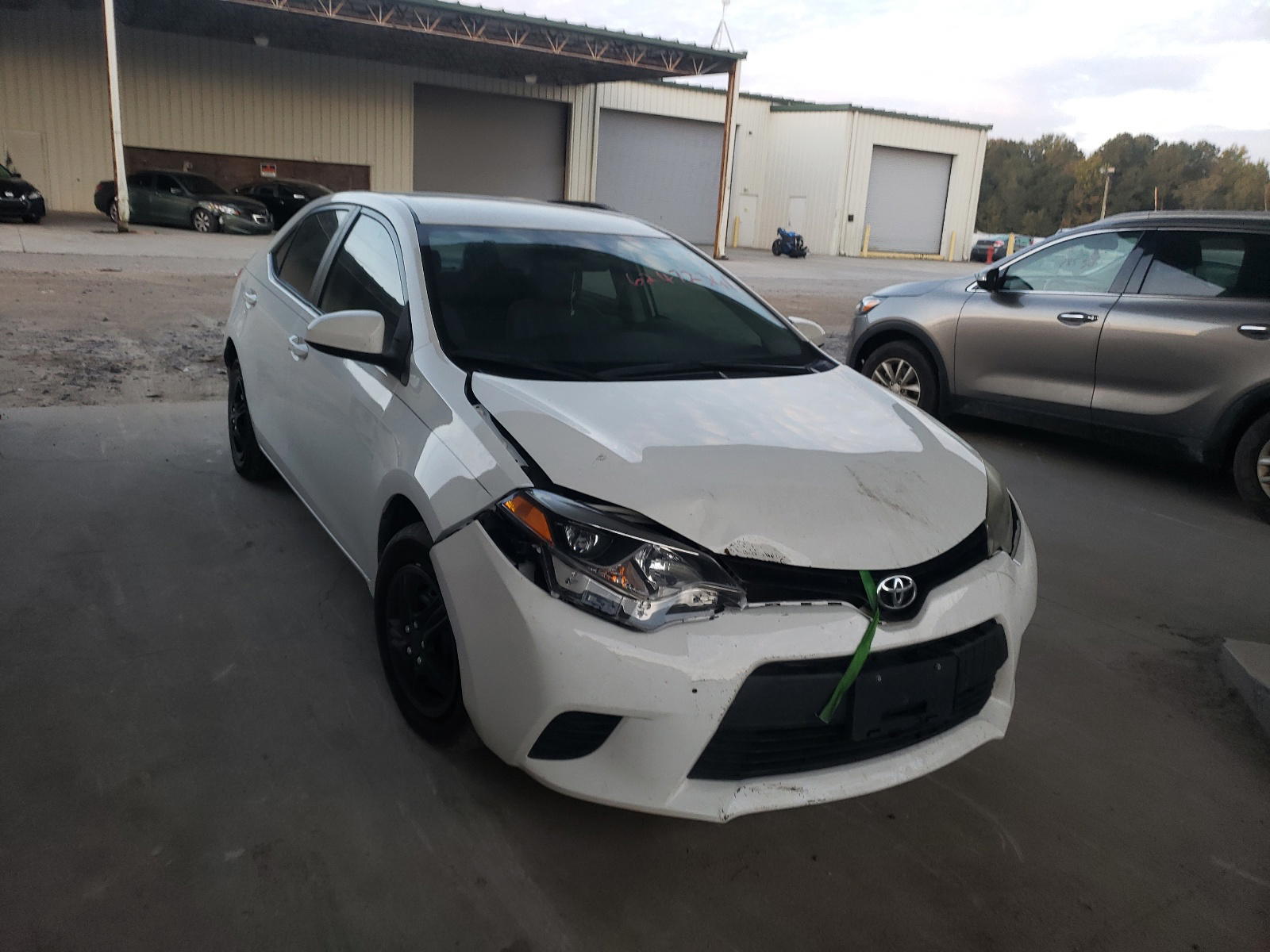 TOYOTA COROLLA L 2015 with VIN 2T1BURHE0FC472490 - Photo from auction