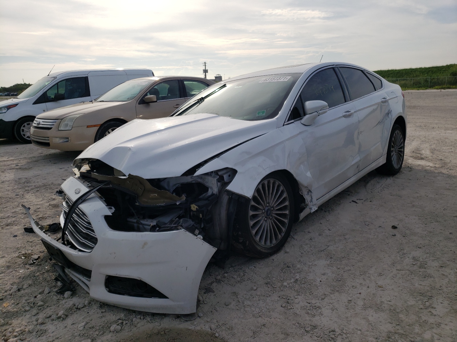 Photo 2 from auction – 2015 FORD FUSION TIT with VIN 3FA6P0K93FR282215