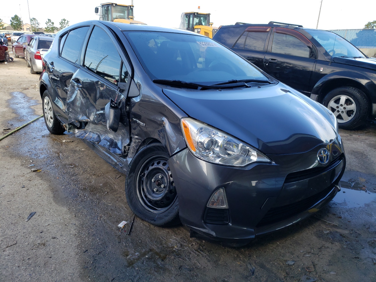 TOYOTA PRIUS C 2014 with VIN JTDKDTB31E1062322 - Photo from auction