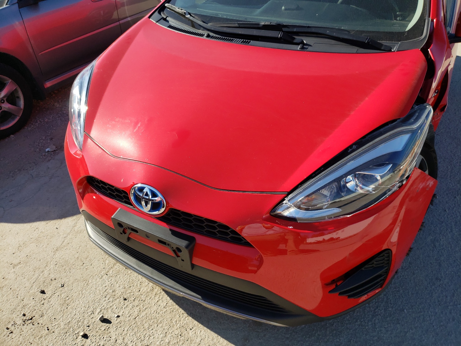 Photo 7 from auction – 2018 TOYOTA PRIUS C with VIN JTDKDTB33J1602862