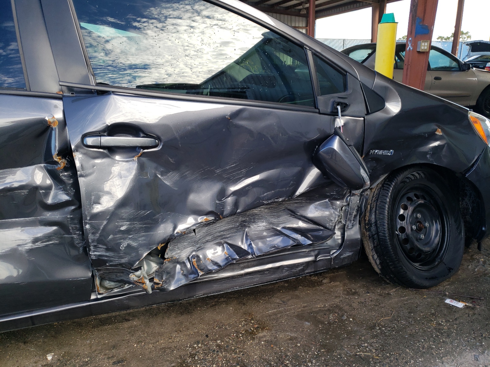 Photo 9 from auction – 2014 TOYOTA PRIUS C with VIN JTDKDTB31E1062322