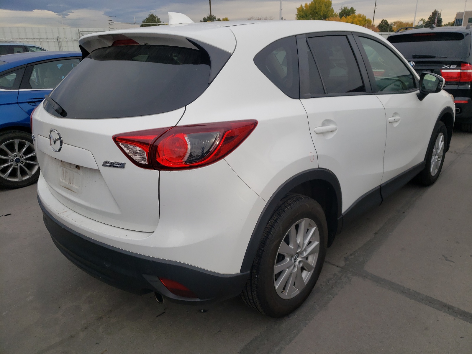 Photo 4 from auction – 2015 MAZDA CX-5 TOURI with VIN JM3KE2CY7F0464023