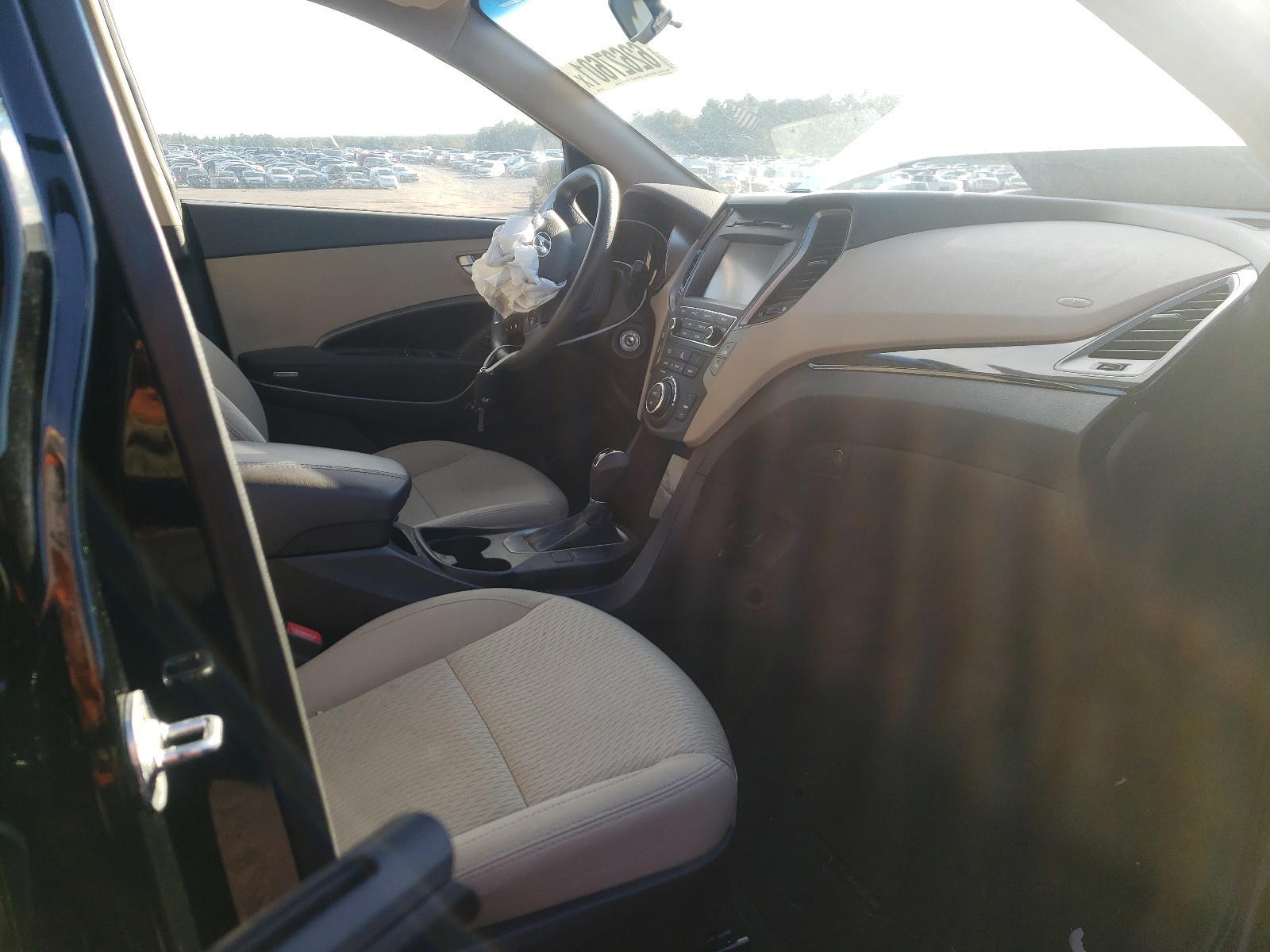 Photo 5 from auction – 2017 HYUNDAI SANTA FE S with VIN 5NMZU3LB2HH040800