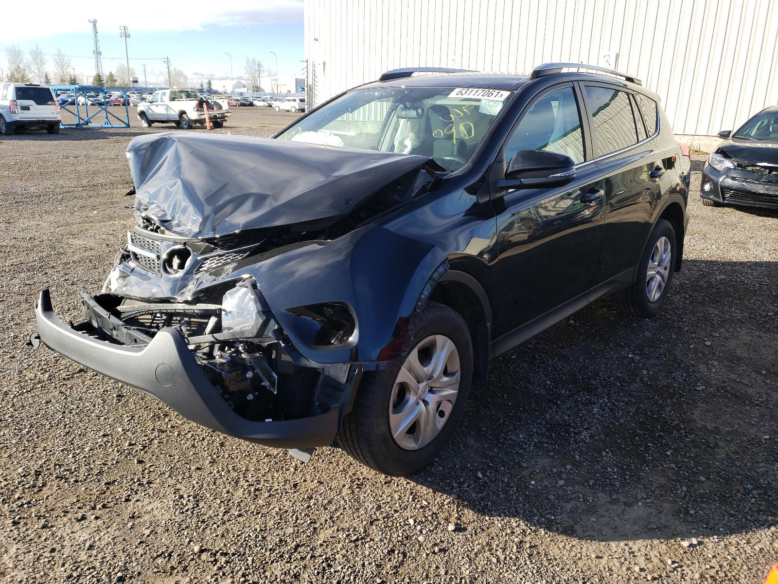 Photo 2 from auction – 2015 TOYOTA RAV4 LE with VIN 2T3BFREV7FW285428