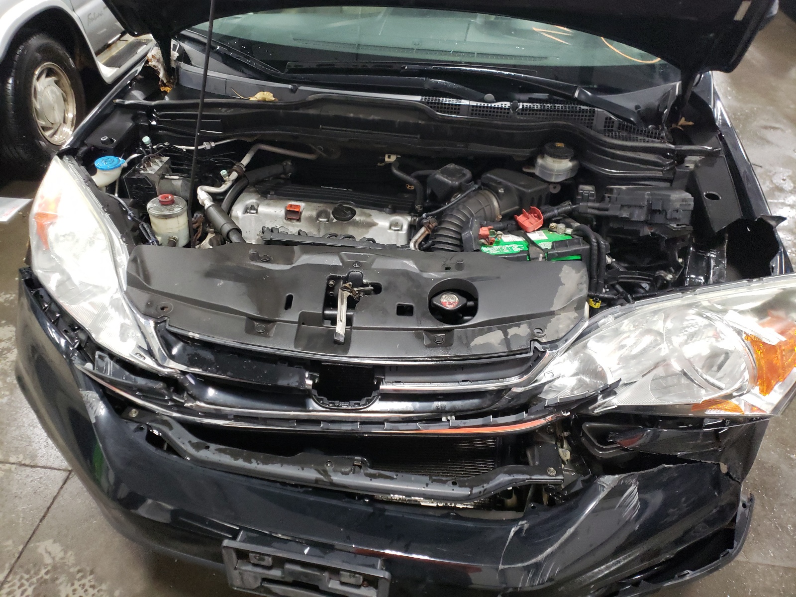 Photo 7 from auction – 2011 HONDA CR-V EXL with VIN 5J6RE4H75BL041799