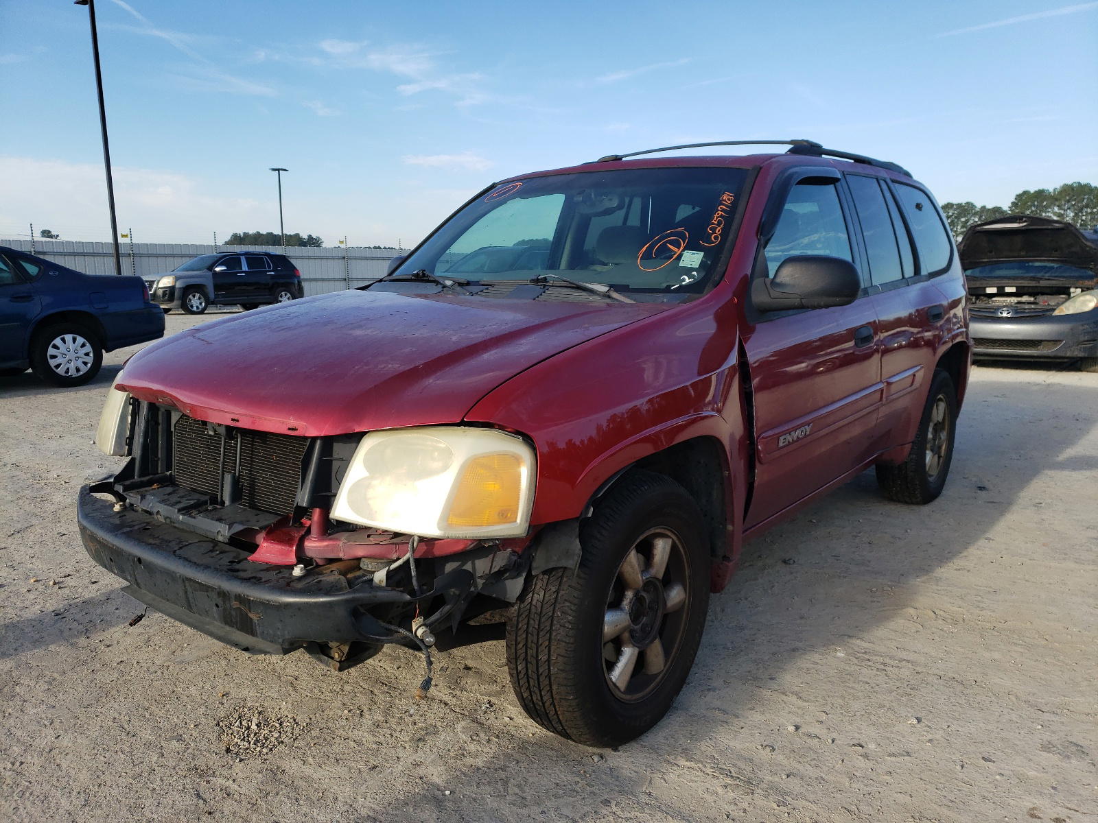 Photo 2 from auction – 2002 GMC ENVOY with VIN 1GKDT13S822476763