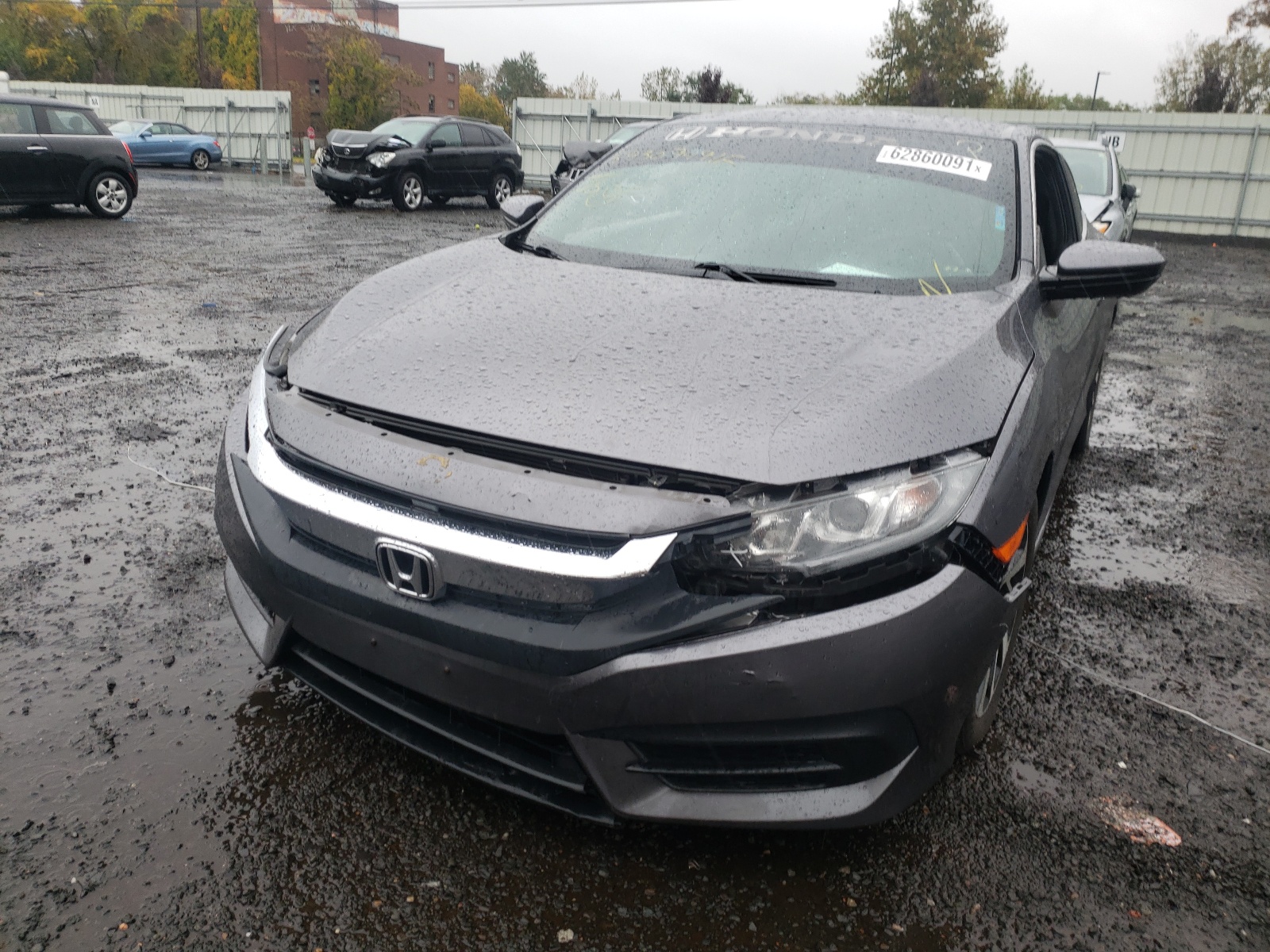 Photo 9 from auction – 2017 HONDA CIVIC LX with VIN 2HGFC4B51HH306263