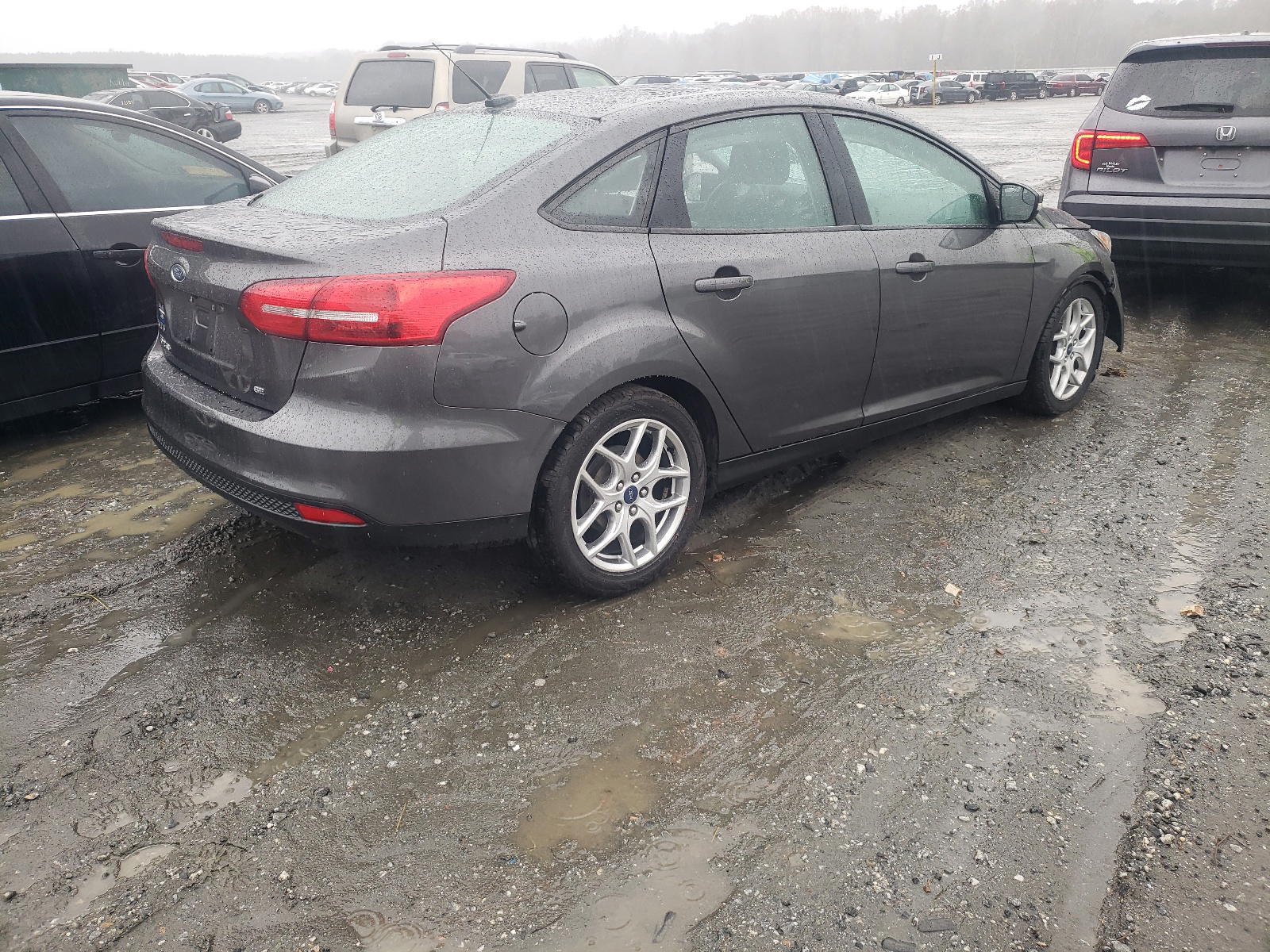 Photo 4 from auction – 2017 FORD FOCUS SE with VIN 1FADP3F21HL322377