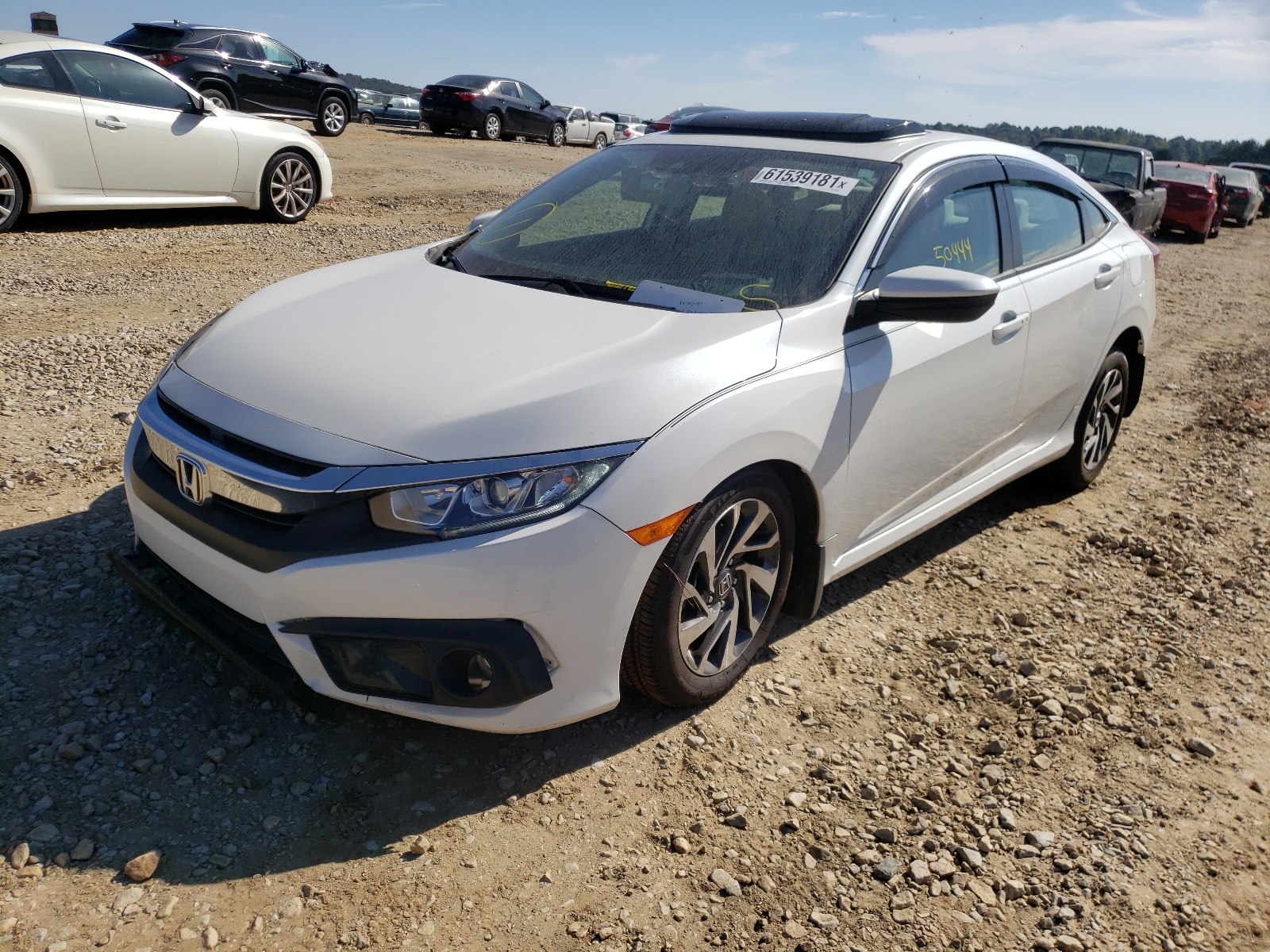 Photo 2 from auction – 2018 HONDA CIVIC EX with VIN 19XFC2F86JE035399