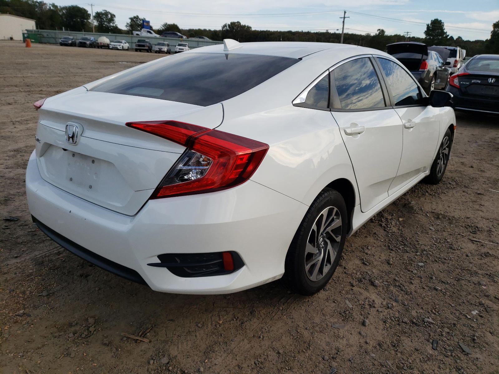 Photo 4 from auction – 2017 HONDA CIVIC EX with VIN 19XFC2F74HE002256