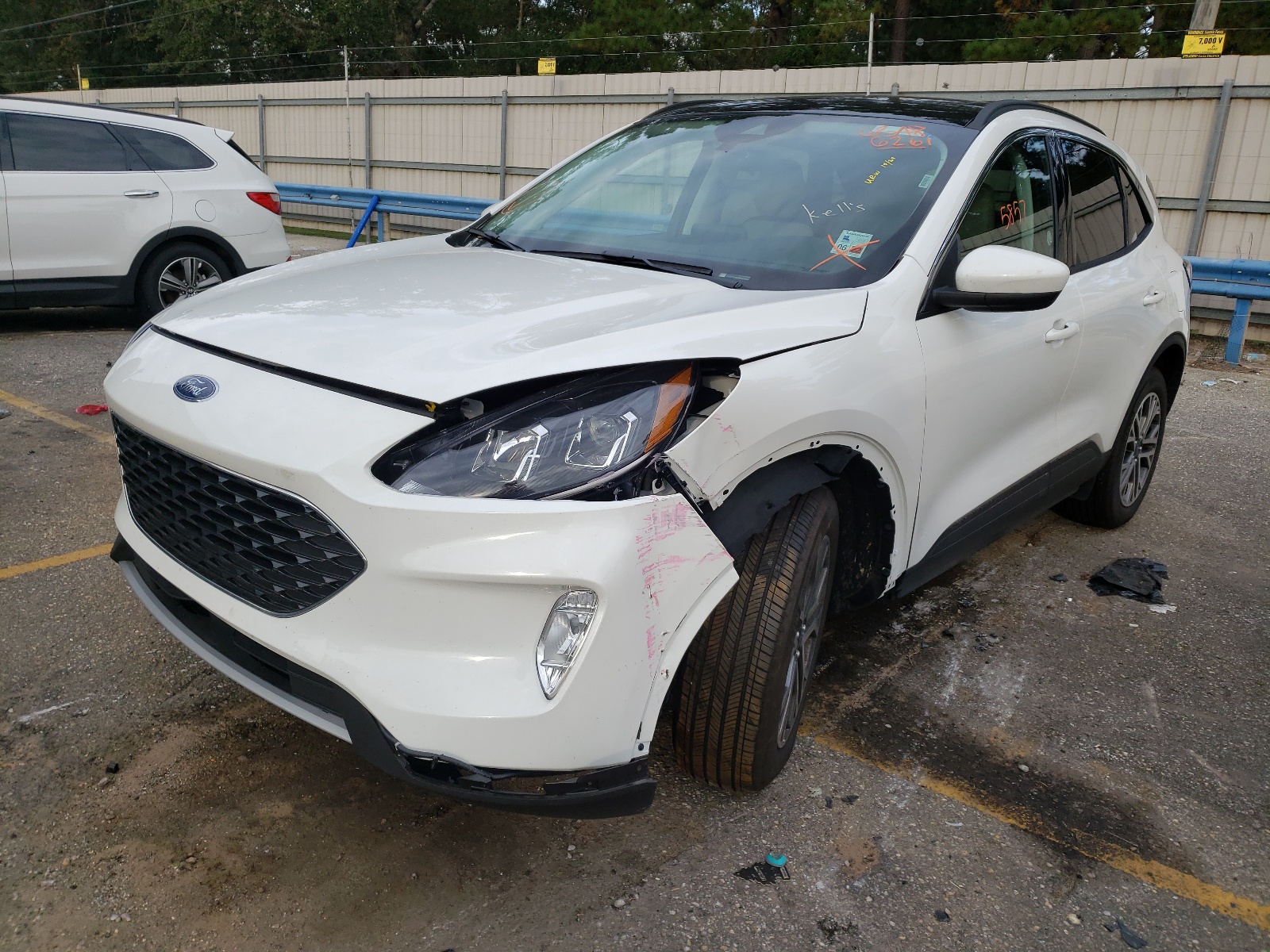 Photo 2 from auction – 2021 FORD ESCAPE SEL with VIN 1FMCU9H65MUA70585