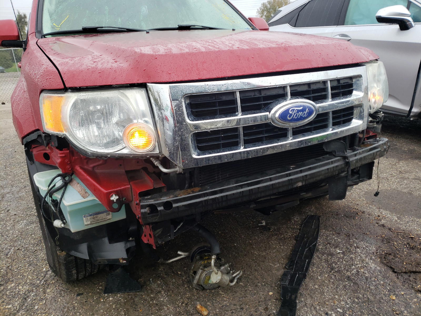 Photo 9 from auction – 2011 FORD ESCAPE LIM with VIN 1FMCU9EG2BKC06211