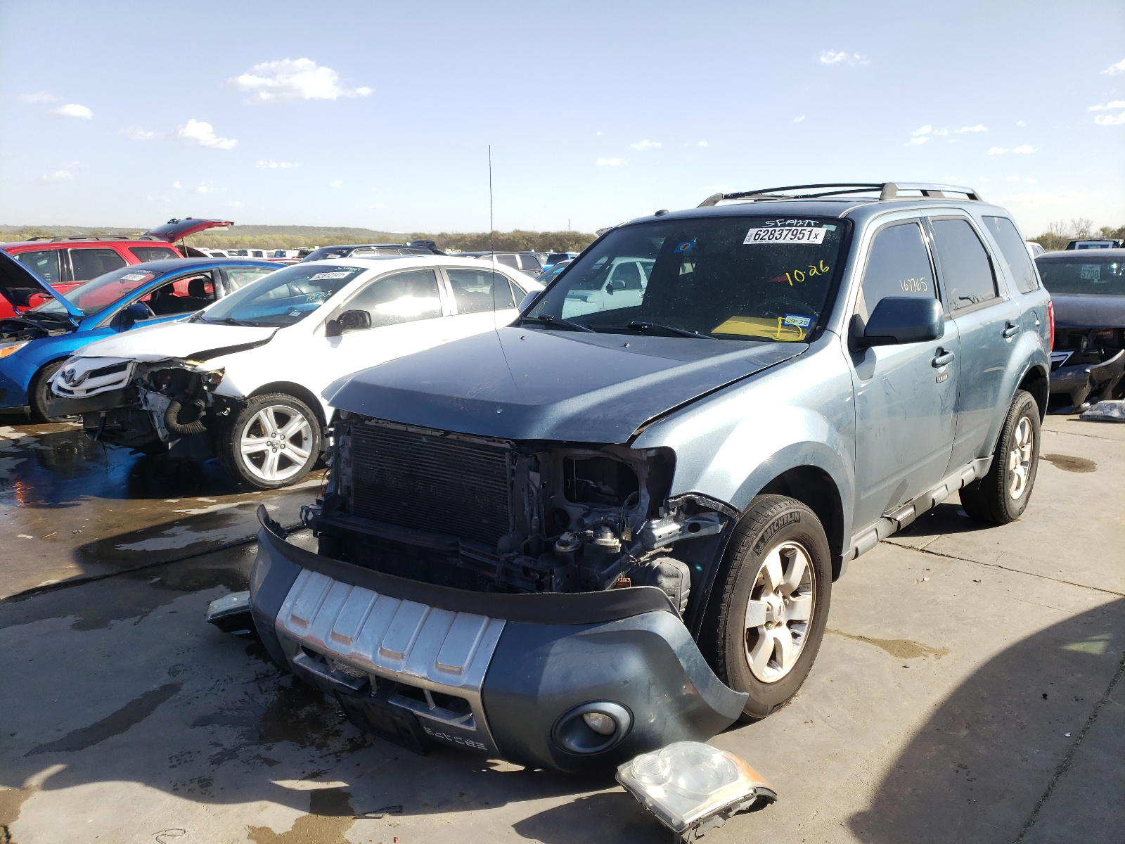 Photo 2 from auction – 2010 FORD ESCAPE LIM with VIN 1FMCU0E75AKD32363