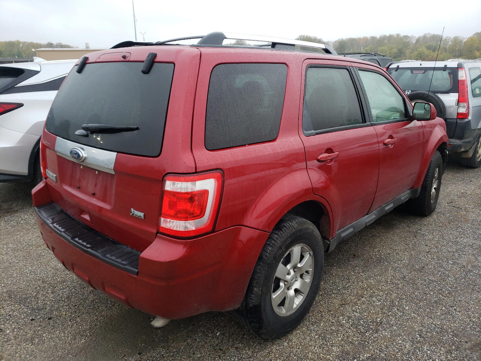 Photo 4 from auction – 2011 FORD ESCAPE LIM with VIN 1FMCU9EG2BKC06211
