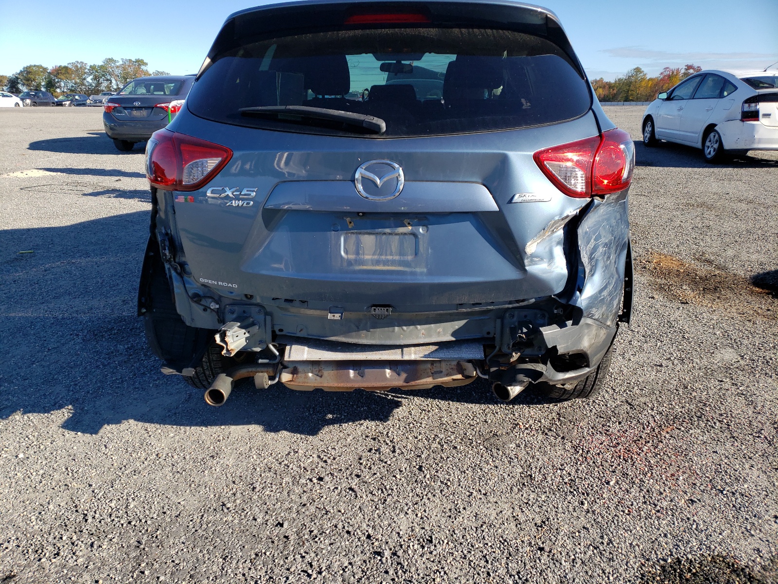 Photo 9 from auction – 2014 MAZDA CX-5 TOURI with VIN JM3KE4CY8E0416444