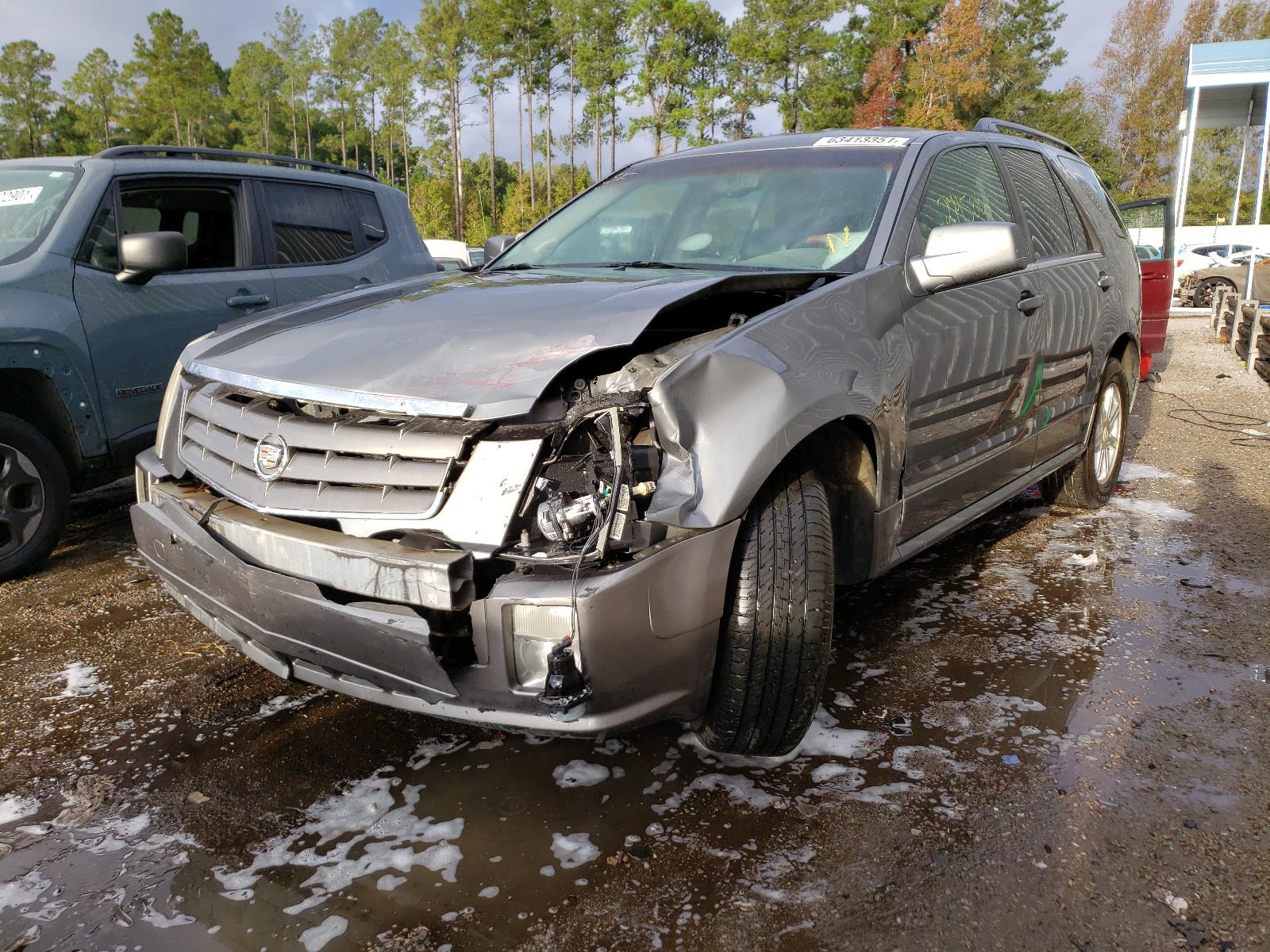 Photo 9 from auction – 2004 CADILLAC SRX with VIN 1GYEE637740144356