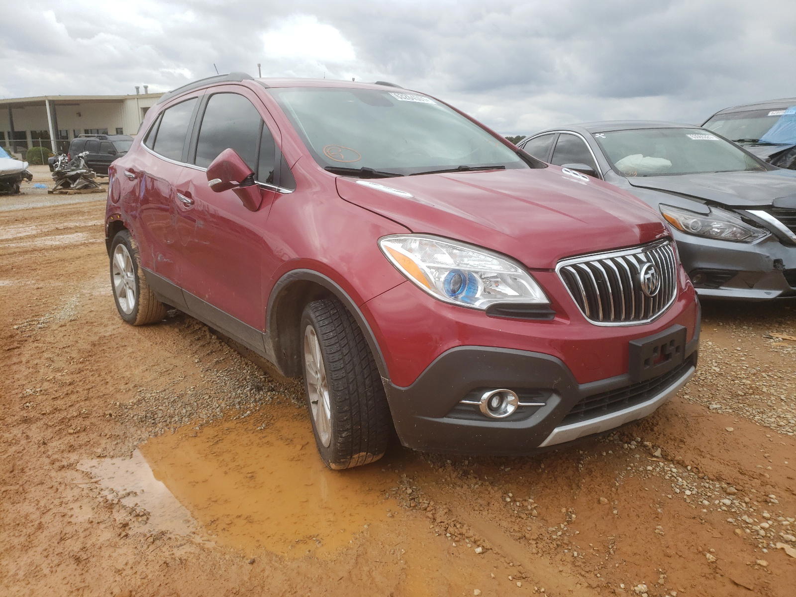 BUICK ENCORE 2015 with VIN KL4CJGSBXFB157897 - Photo from auction