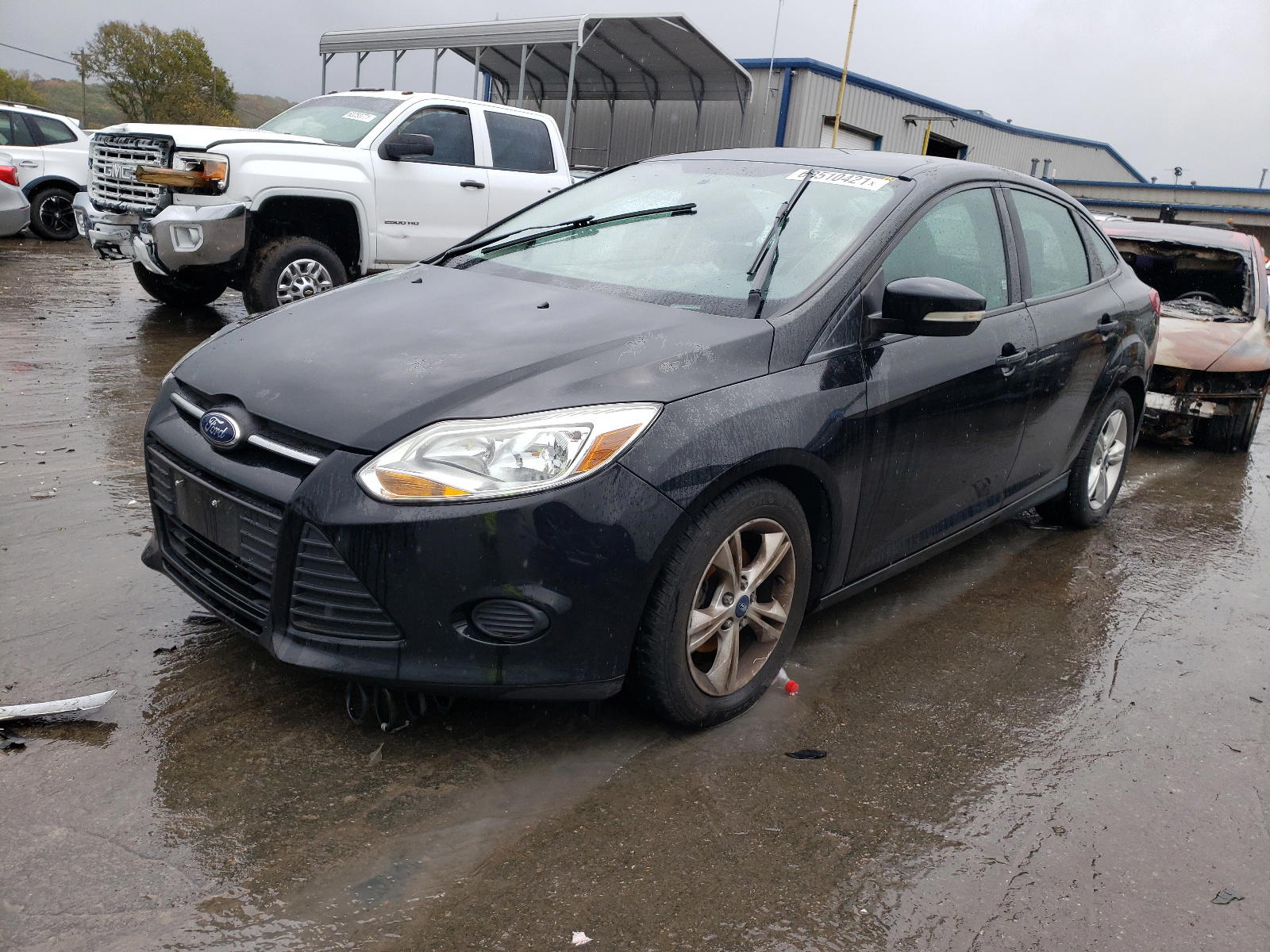 Photo 2 from auction – 2013 FORD FOCUS SE with VIN 1FADP3F22DL210018