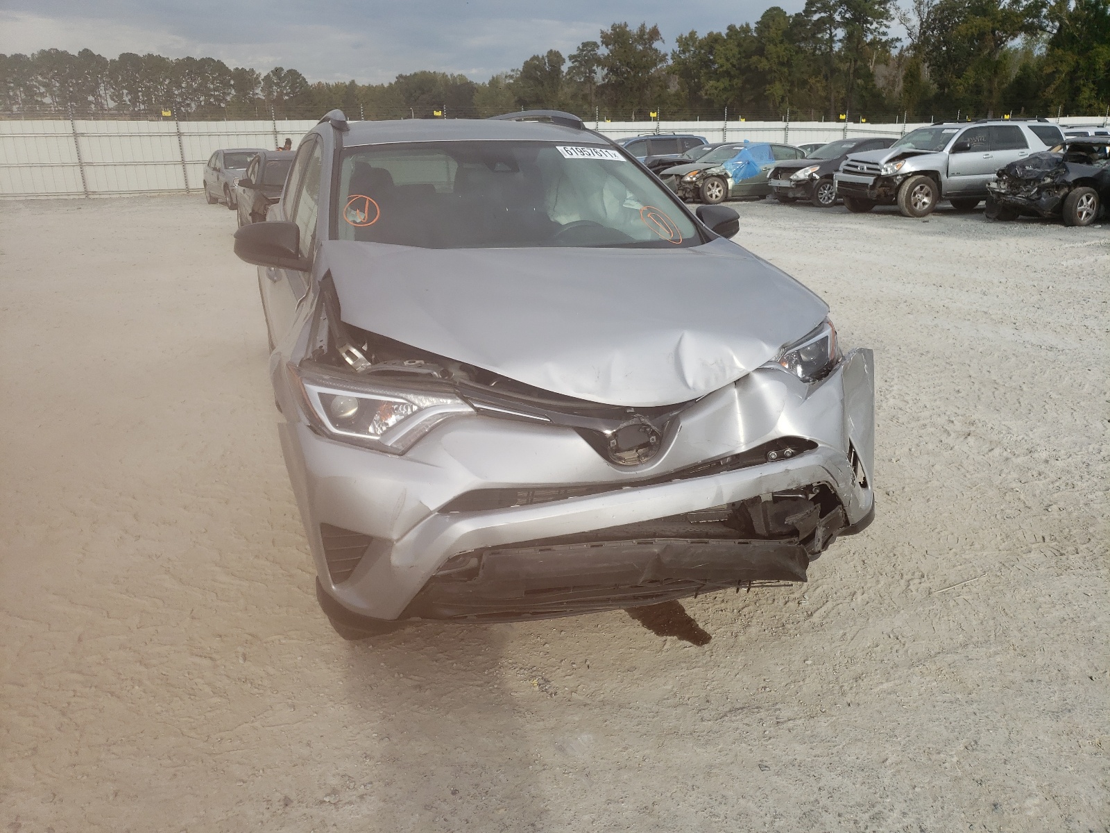Photo 9 from auction – 2018 TOYOTA RAV4 LE with VIN 2T3ZFREV1JW522308