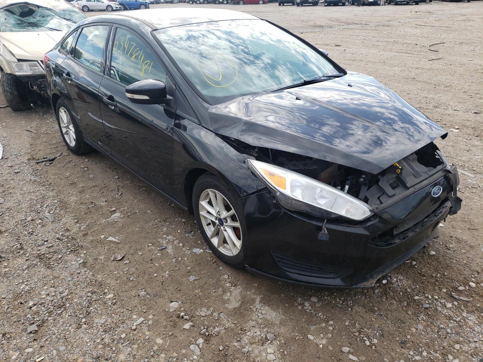 FORD FOCUS SE 2015 with VIN 1FADP3F23FL293297 - Photo from auction