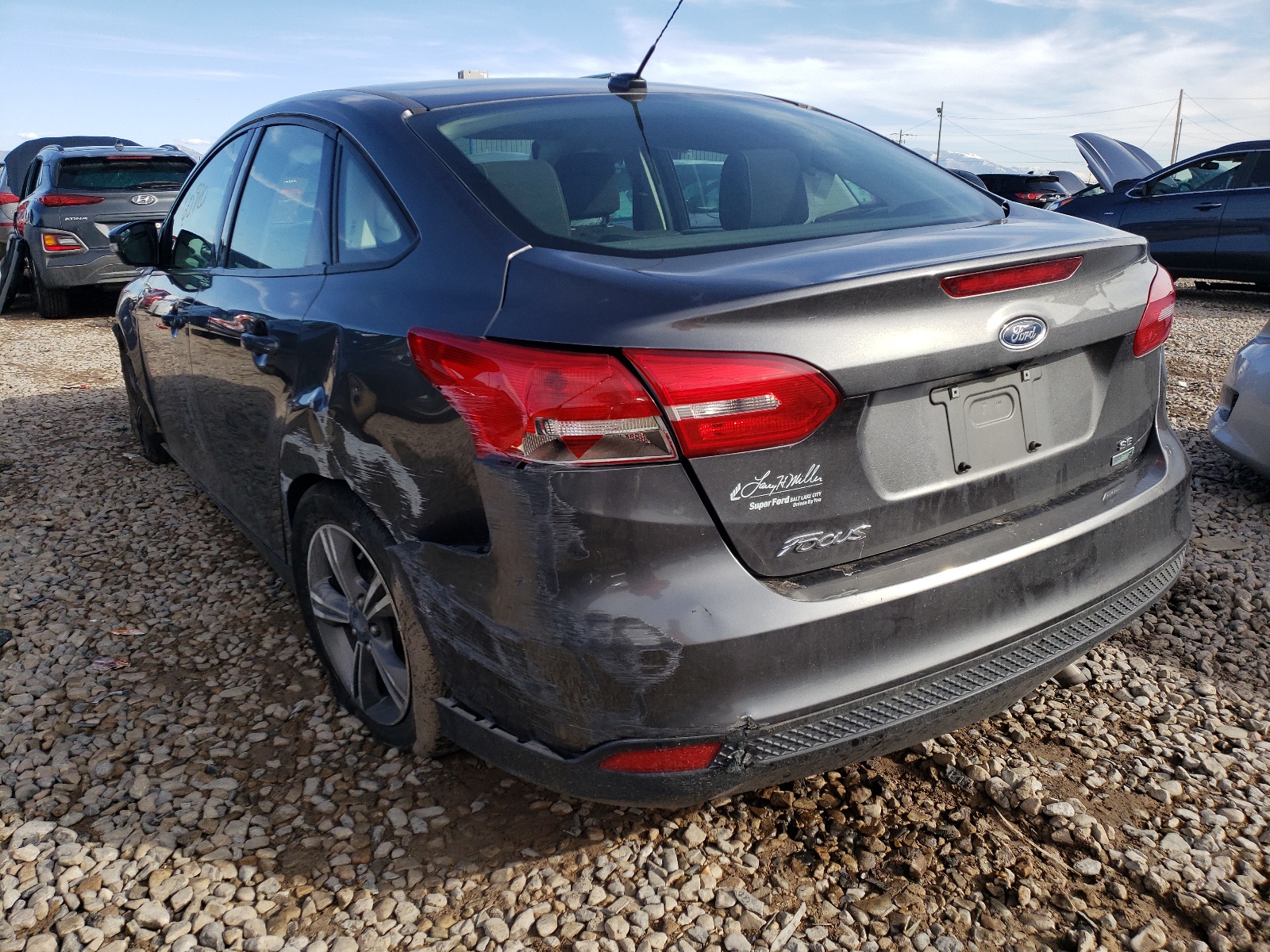 Фото 3 с аукциона – 2018 FORD FOCUS SE с VIN 1FADP3FE6JL322200