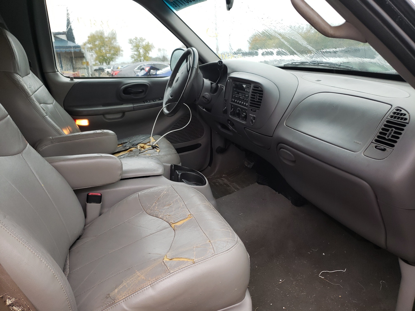 Photo 5 from auction – 1999 FORD F150 with VIN 1FTRX18L5XKA06219