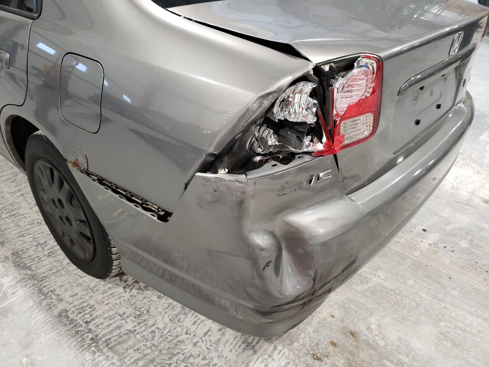 Photo 9 from auction – 2005 HONDA CIVIC LX with VIN JHMES16565S002936