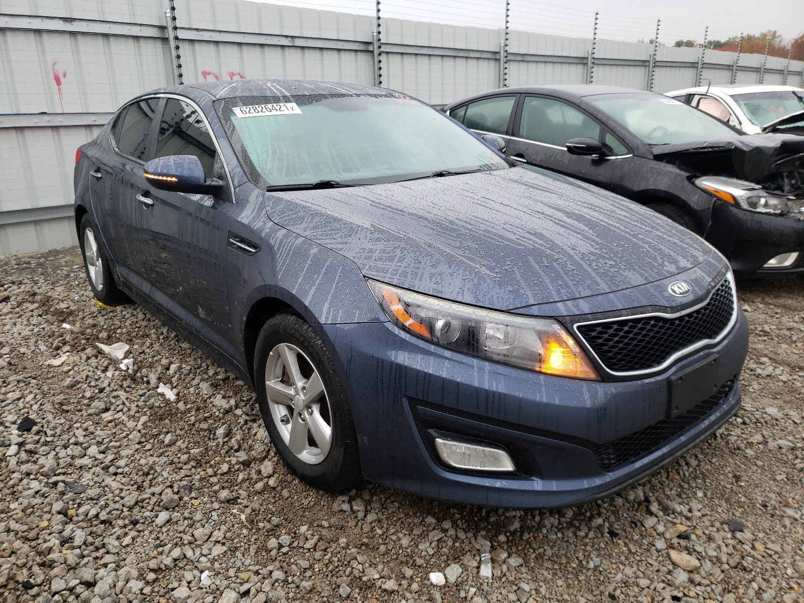 KIA OPTIMA LX 2015 with VIN 5XXGM4A70FG404719 - Photo from auction