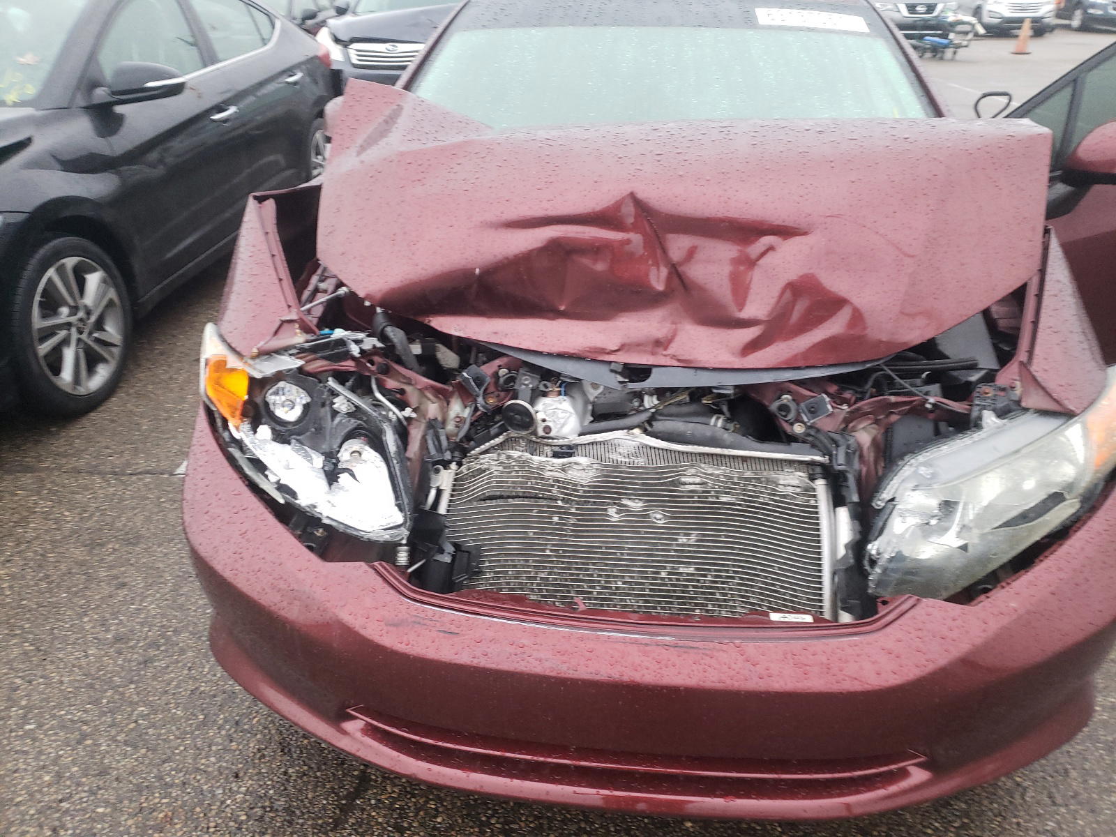 Photo 7 from auction – 2012 HONDA CIVIC LX with VIN 19XFB2F52CE031524