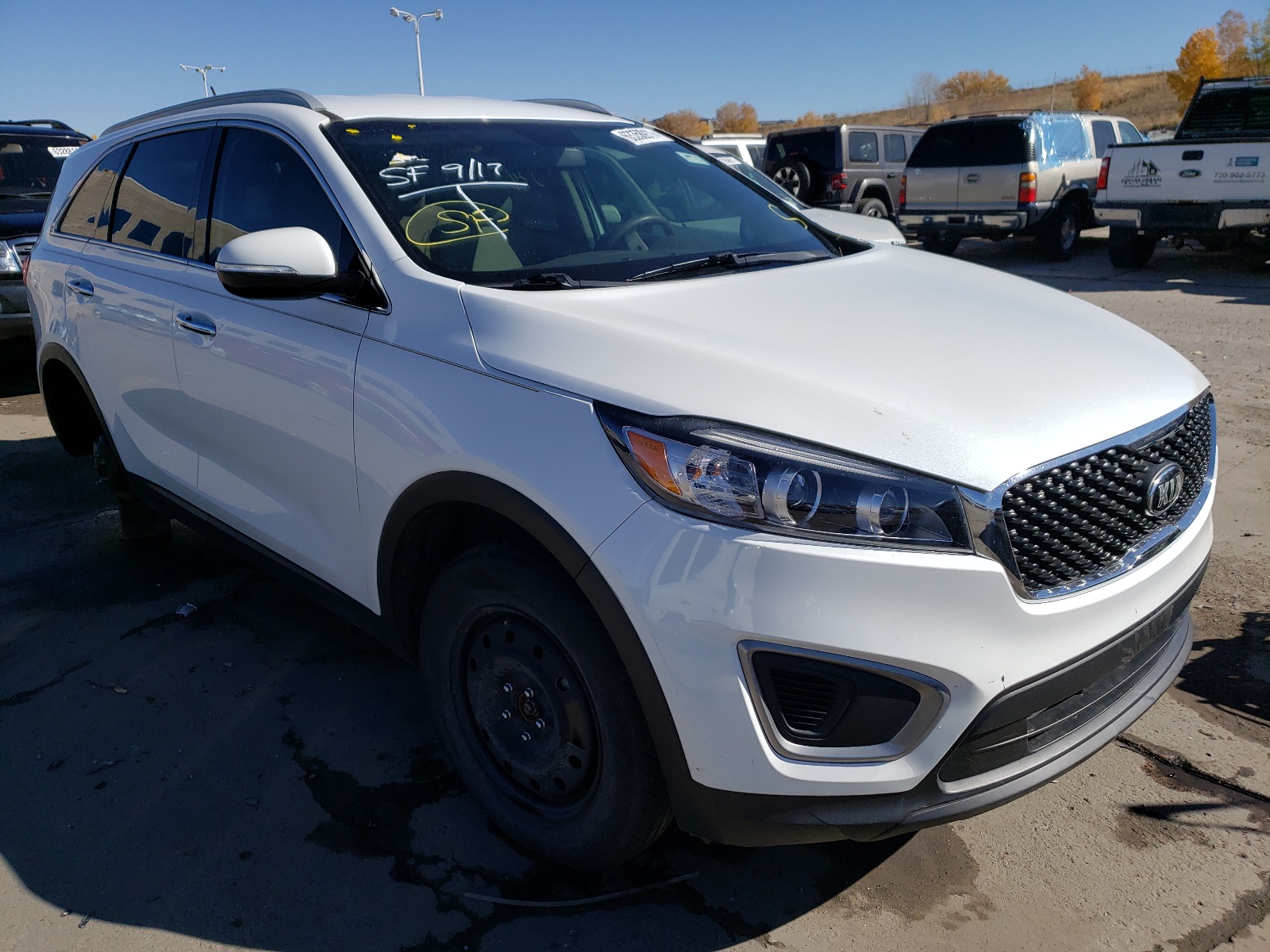 KIA SORENTO LX 2016 with VIN 5XYPG4A34GG147128 - Photo from auction