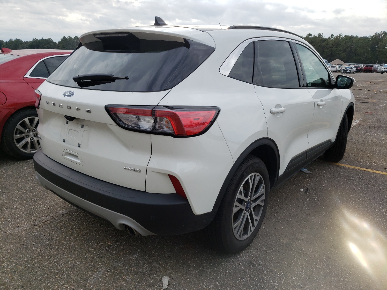 Photo 4 from auction – 2021 FORD ESCAPE SEL with VIN 1FMCU9H65MUA70585