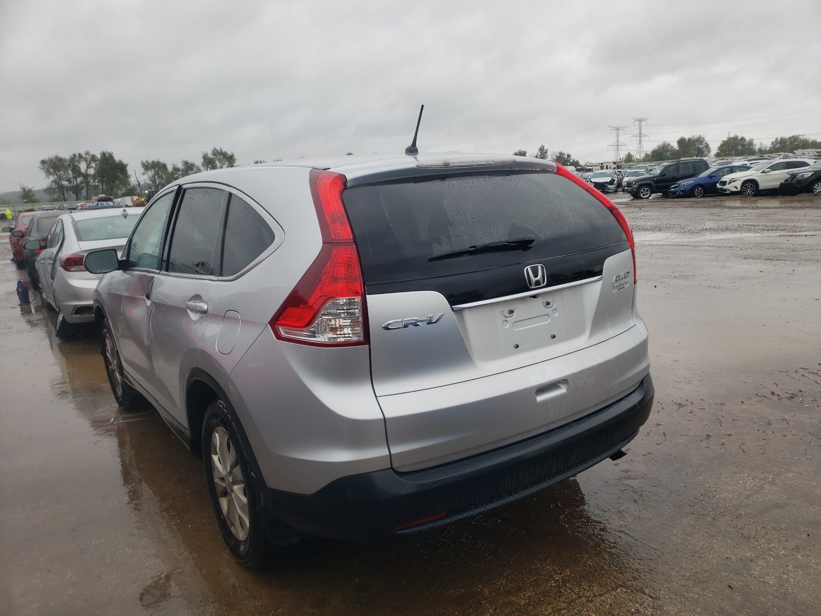 Photo 3 from auction – 2013 HONDA CR-V EX with VIN 2HKRM4H51DH679238