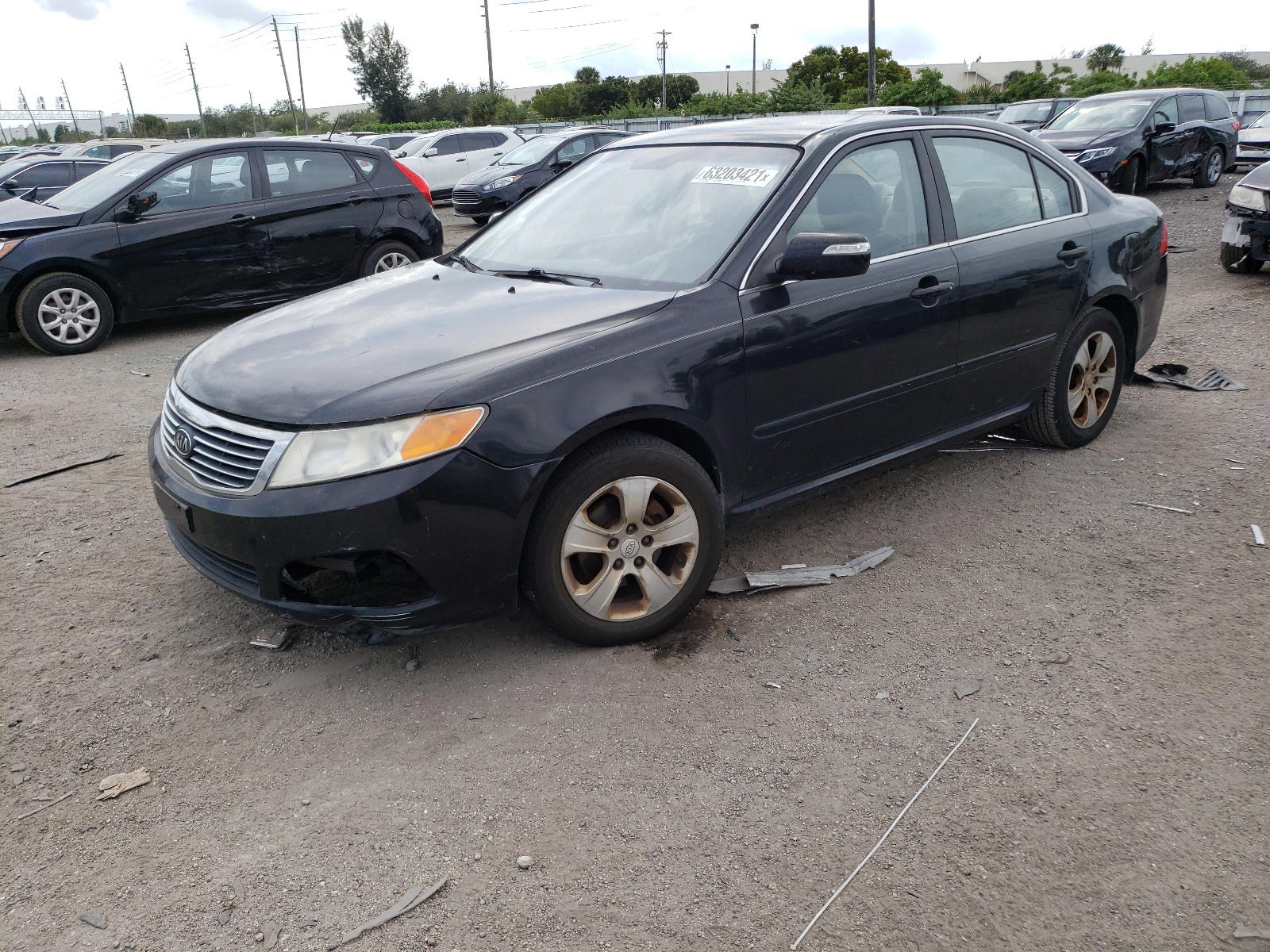 Photo 2 from auction – 2009 KIA OPTIMA with VIN KNAGE228895310215