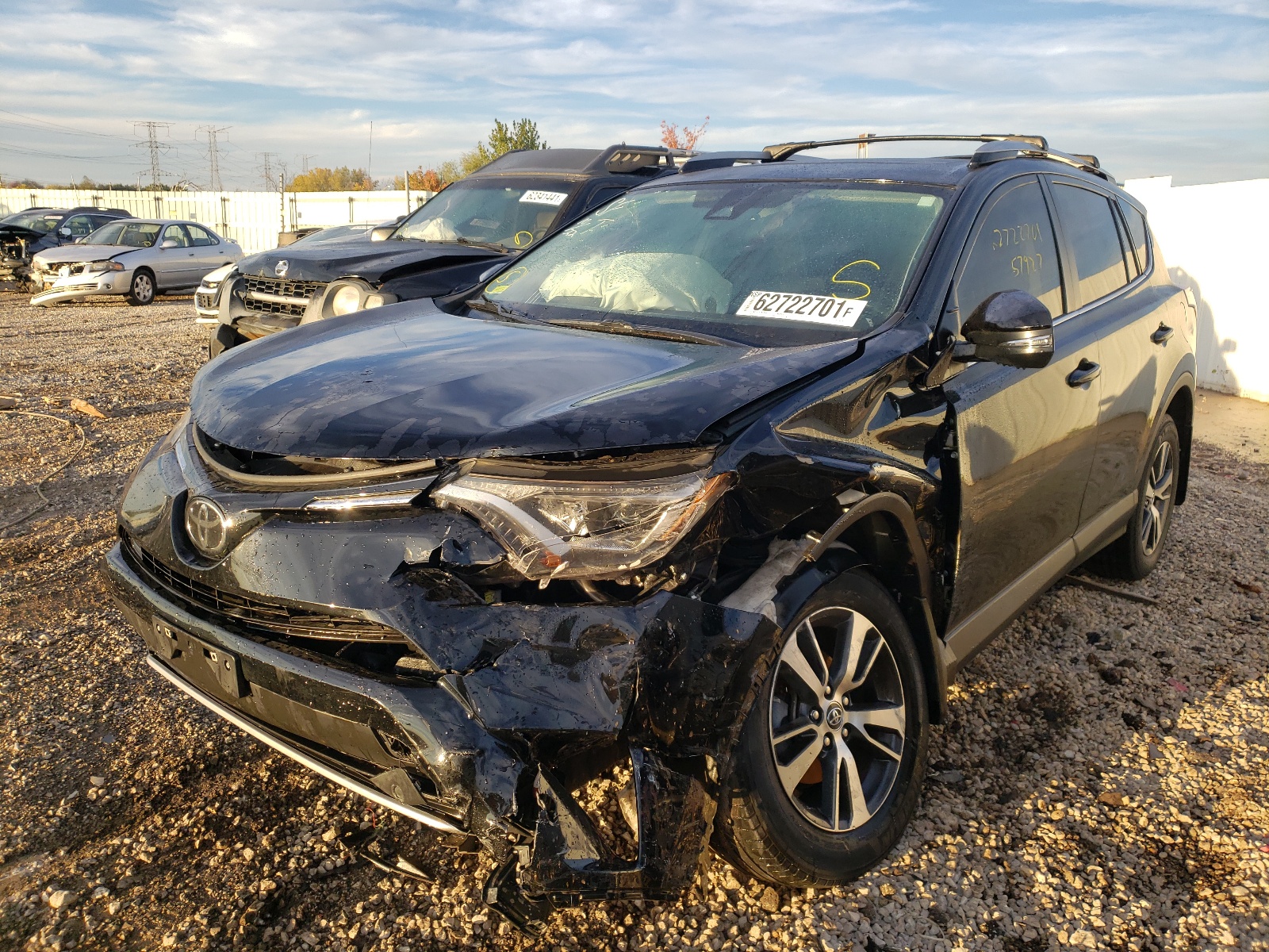 Photo 2 from auction – 2017 TOYOTA RAV4 XLE with VIN 2T3RFREV0HW591291