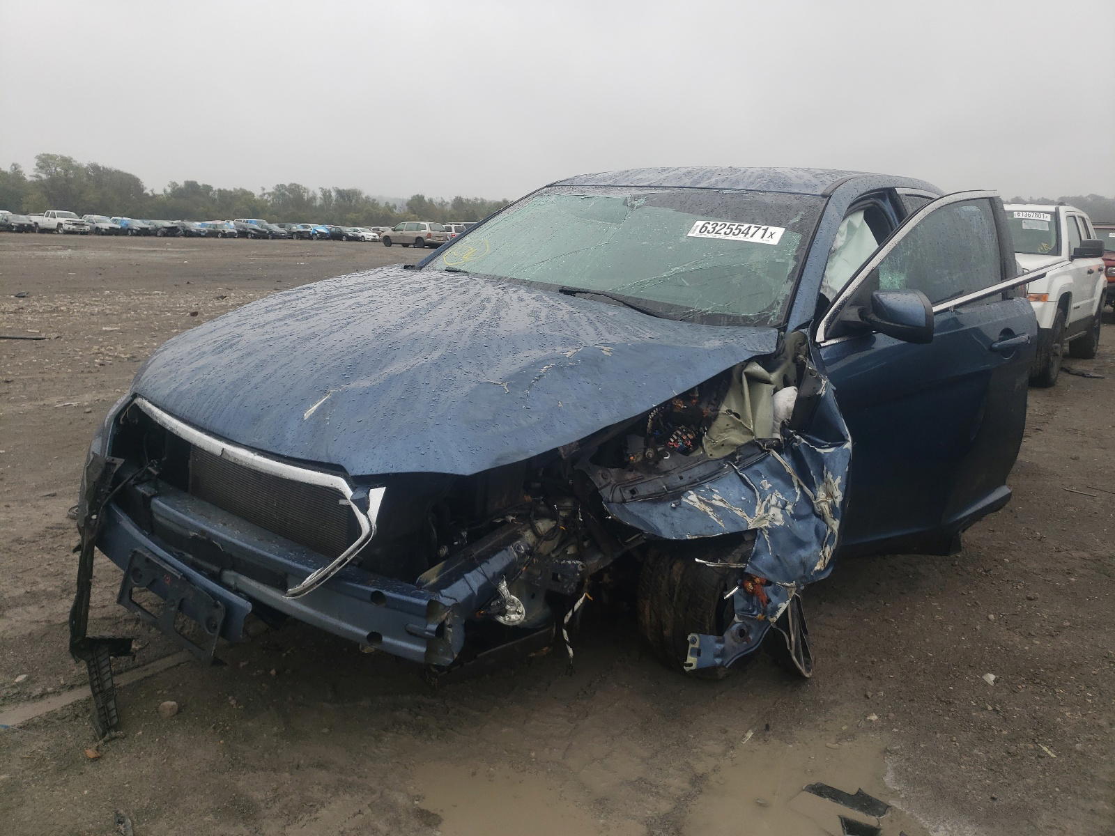 Photo 2 from auction – 2018 FORD TAURUS SEL with VIN 1FAHP2E80JG116189