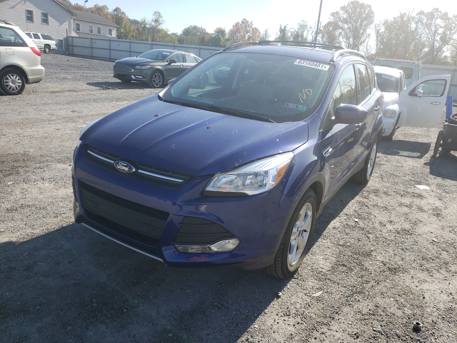 Photo 2 from auction – 2014 FORD ESCAPE SE with VIN 1FMCU9GX1EUE05899