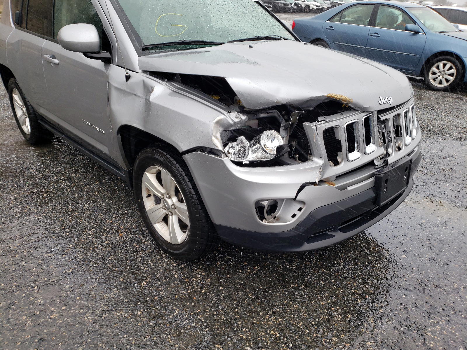Photo 9 from auction – 2015 JEEP COMPASS LA with VIN 1C4NJDEB4FD259564