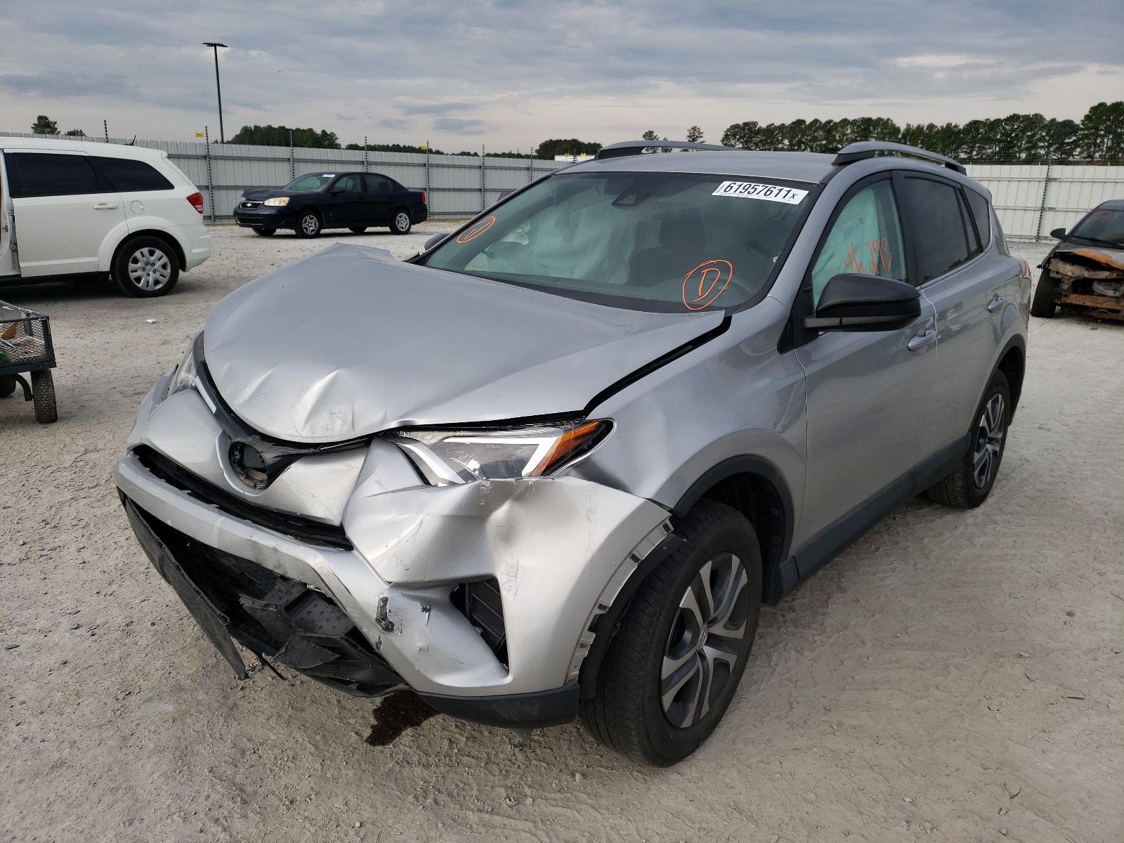 Photo 2 from auction – 2018 TOYOTA RAV4 LE with VIN 2T3ZFREV1JW522308