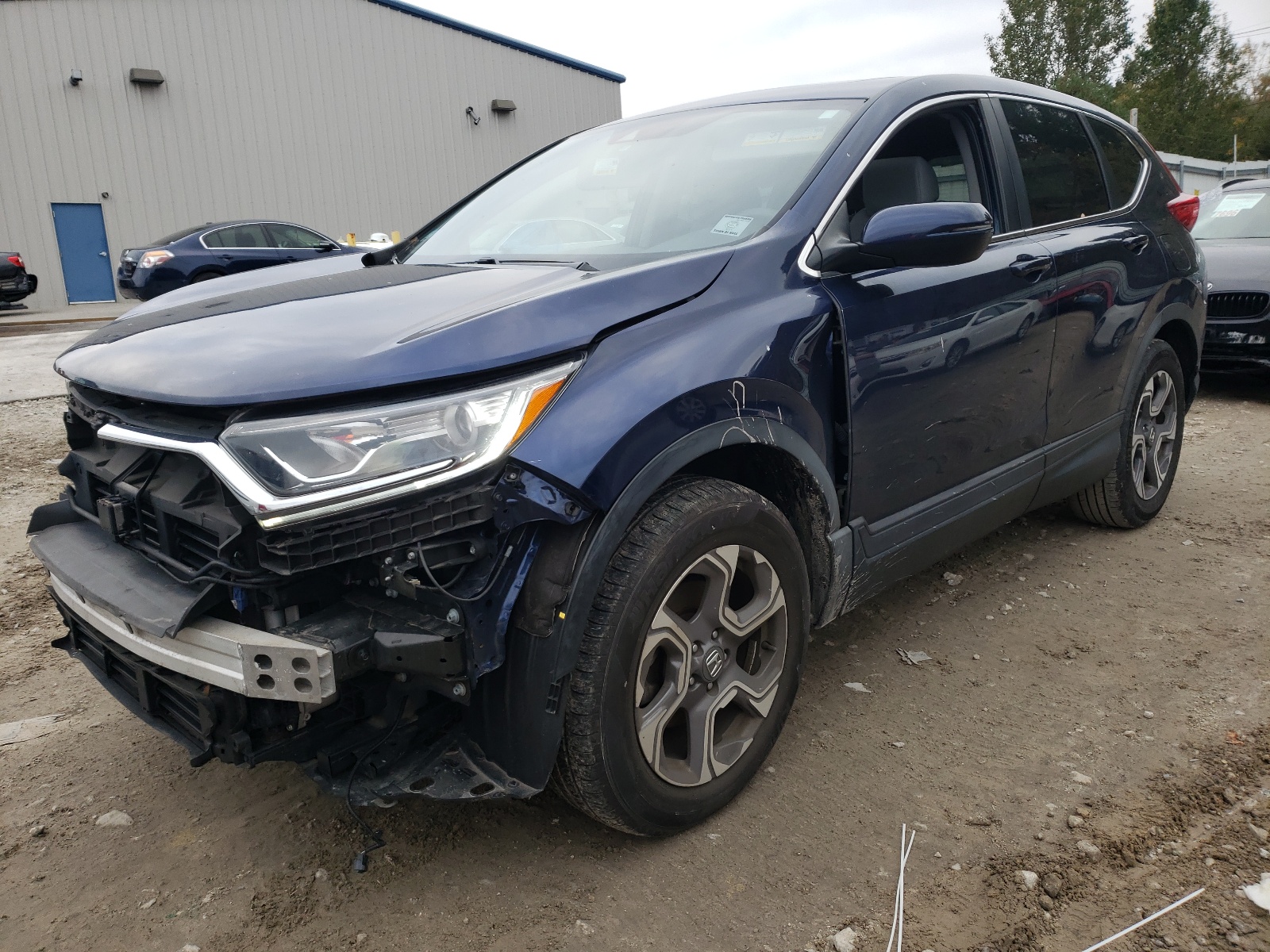 Photo 2 from auction – 2017 HONDA CR-V EX with VIN 5J6RW2H51HL045034