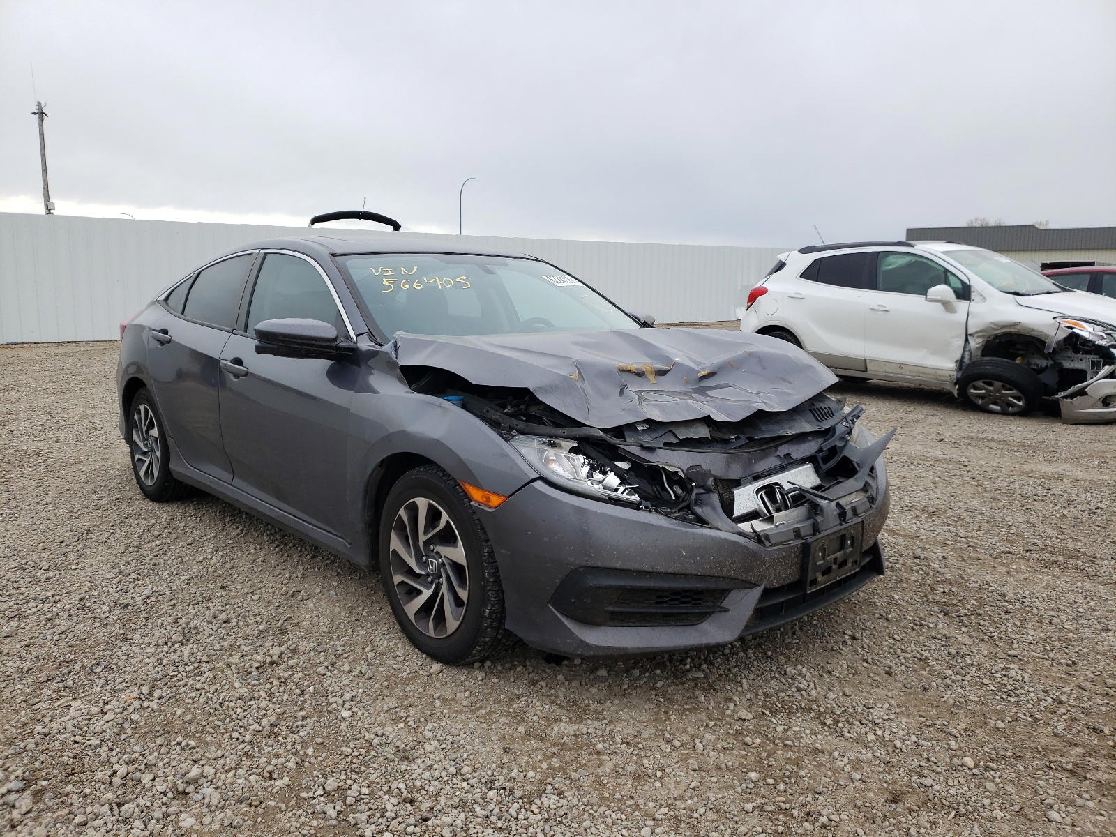 HONDA CIVIC EX 2017 with VIN 2HGFC2F71HH566405 - Photo from auction