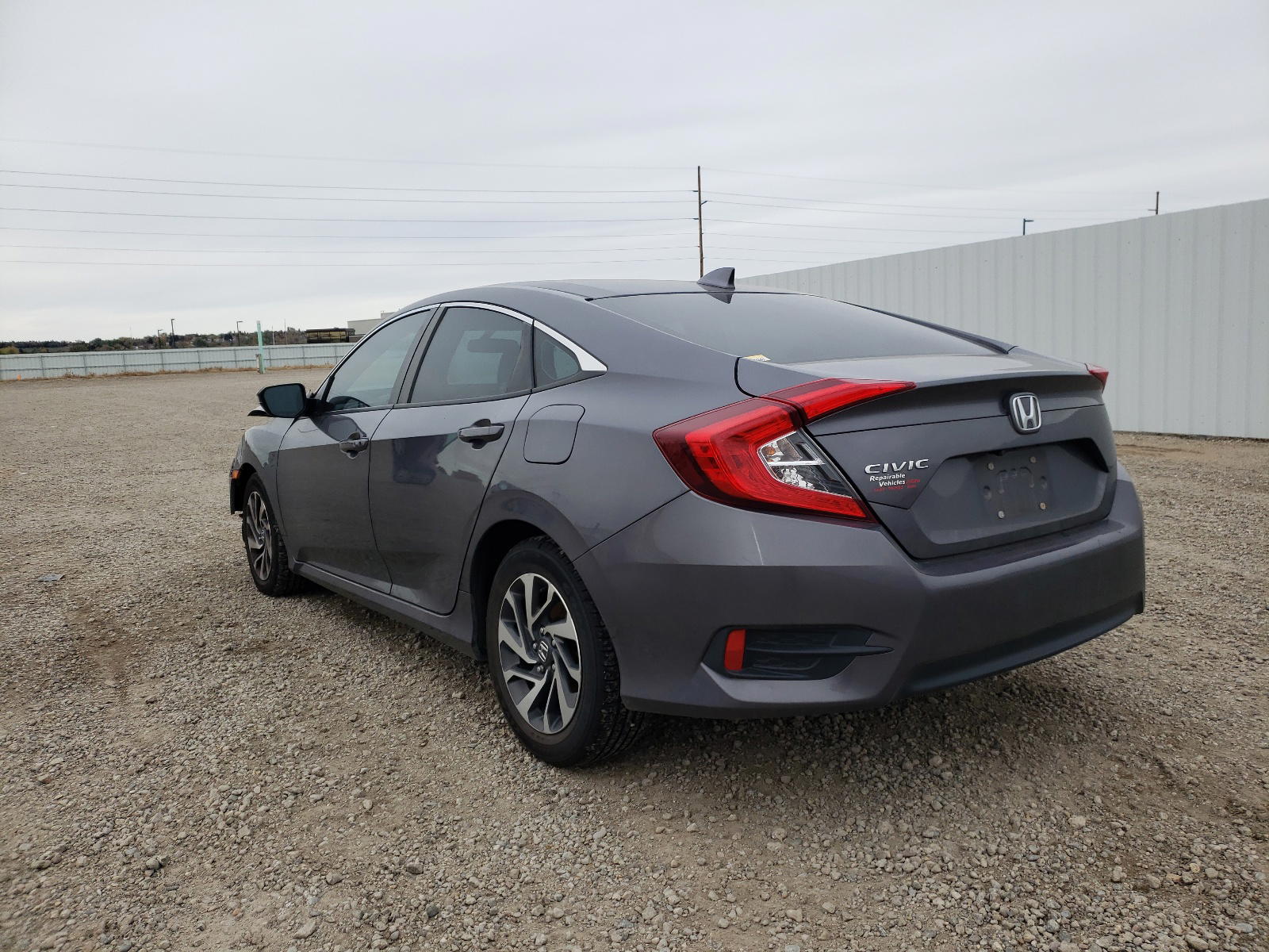 Photo 3 from auction – 2017 HONDA CIVIC EX with VIN 2HGFC2F71HH566405