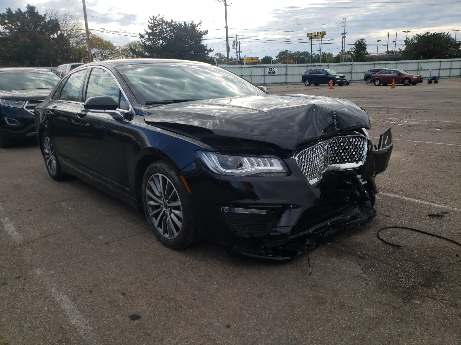 LINCOLN MKZ 2020 with VIN 3LN6L5A97LR615351 - Photo from auction