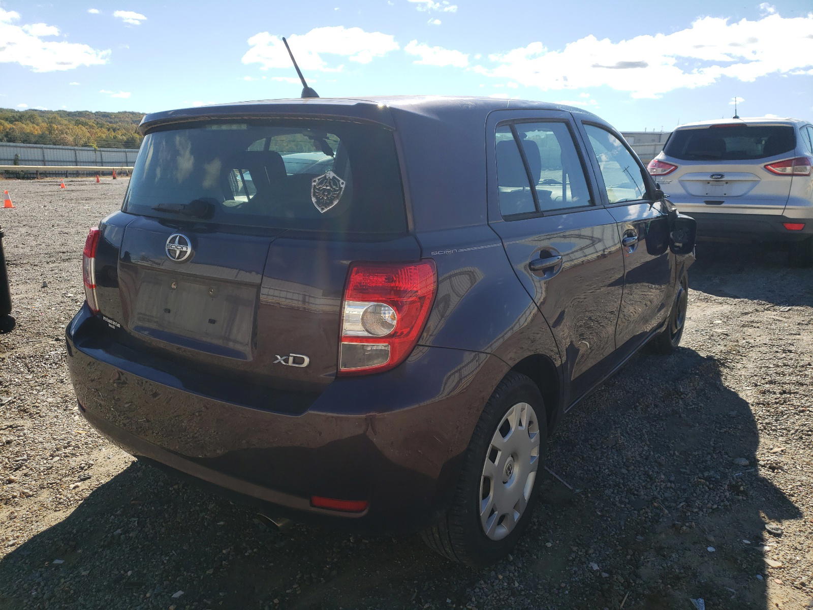 Photo 4 from auction – 2010 TOYOTA SCION XD with VIN JTKKU4B44A1004609