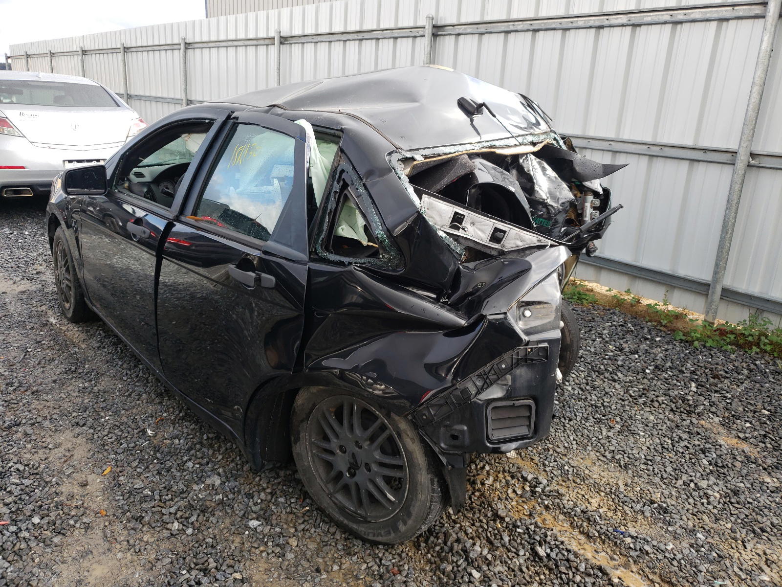 Photo 3 from auction – 2011 FORD FOCUS SE with VIN 1FAHP3FN7BW180330