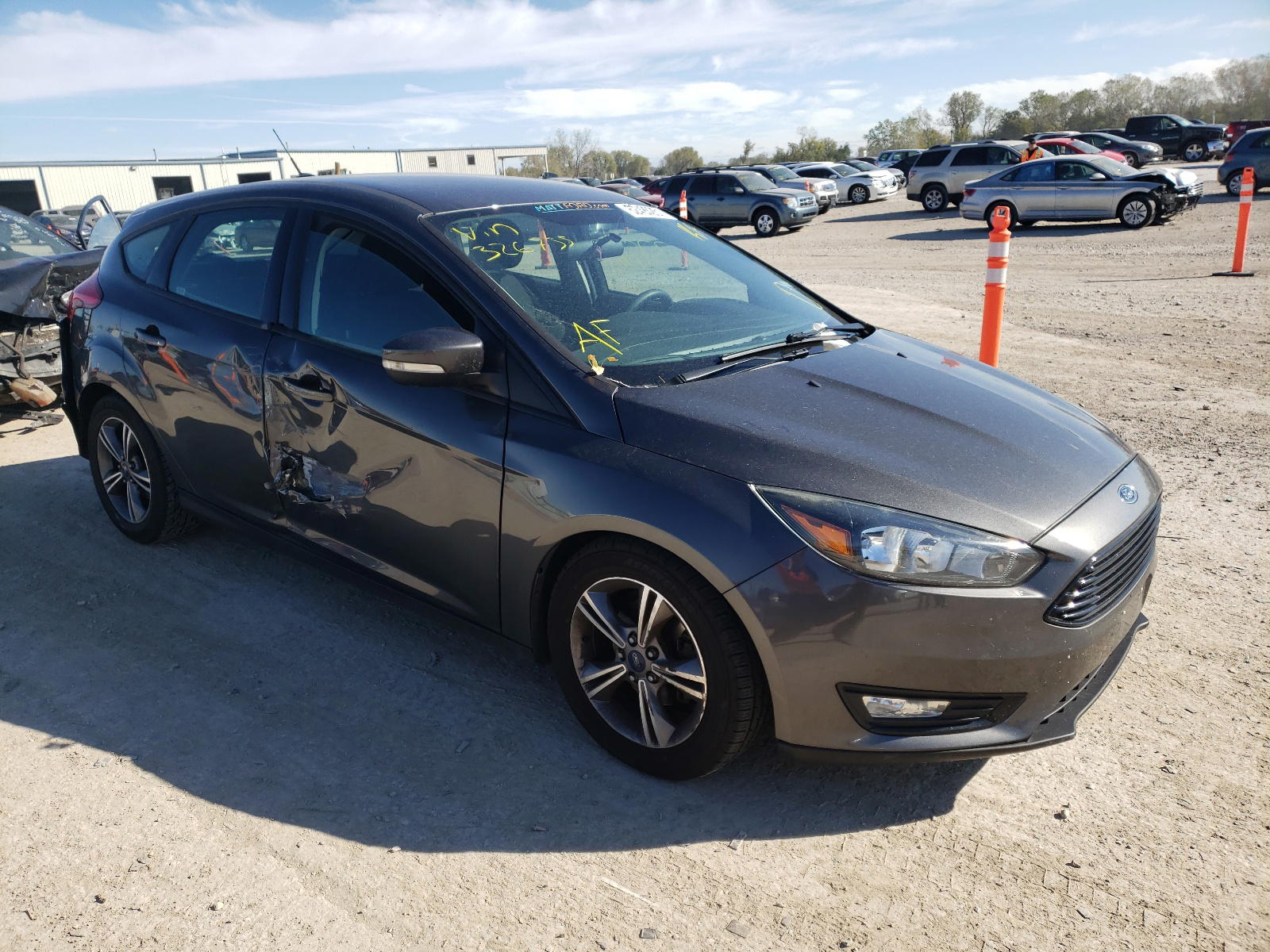 FORD FOCUS SE 2016 with VIN 1FADP3KE1GL326735 - Photo from auction